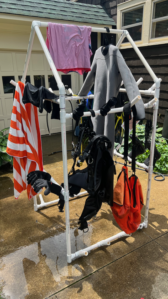 The scuba rack, with various gear hung on it, on a different day