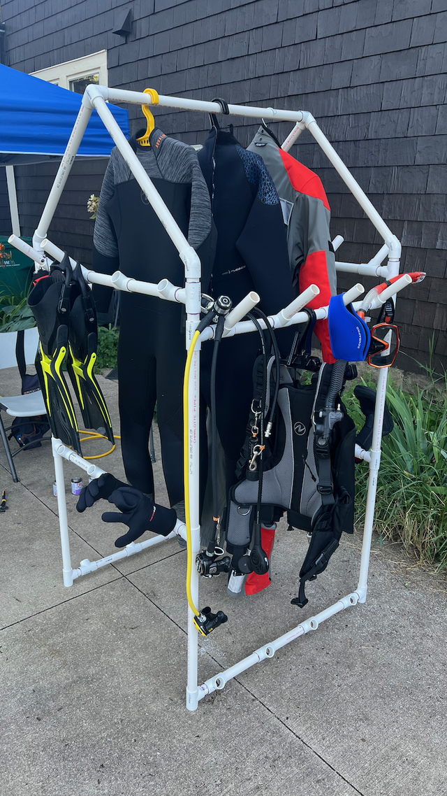 The scuba rack, with various gear hung on it